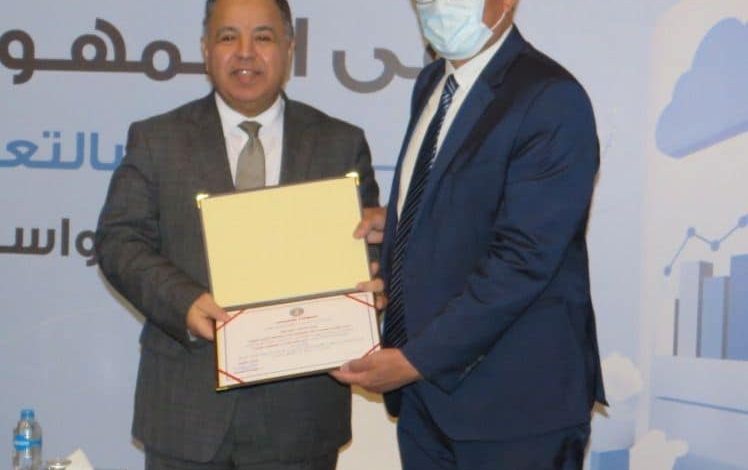 وزير المالية يكرم الخبير الدولي حسن عودة بالألمانية بالقاهرة 1 IMG 20220320 WA0098